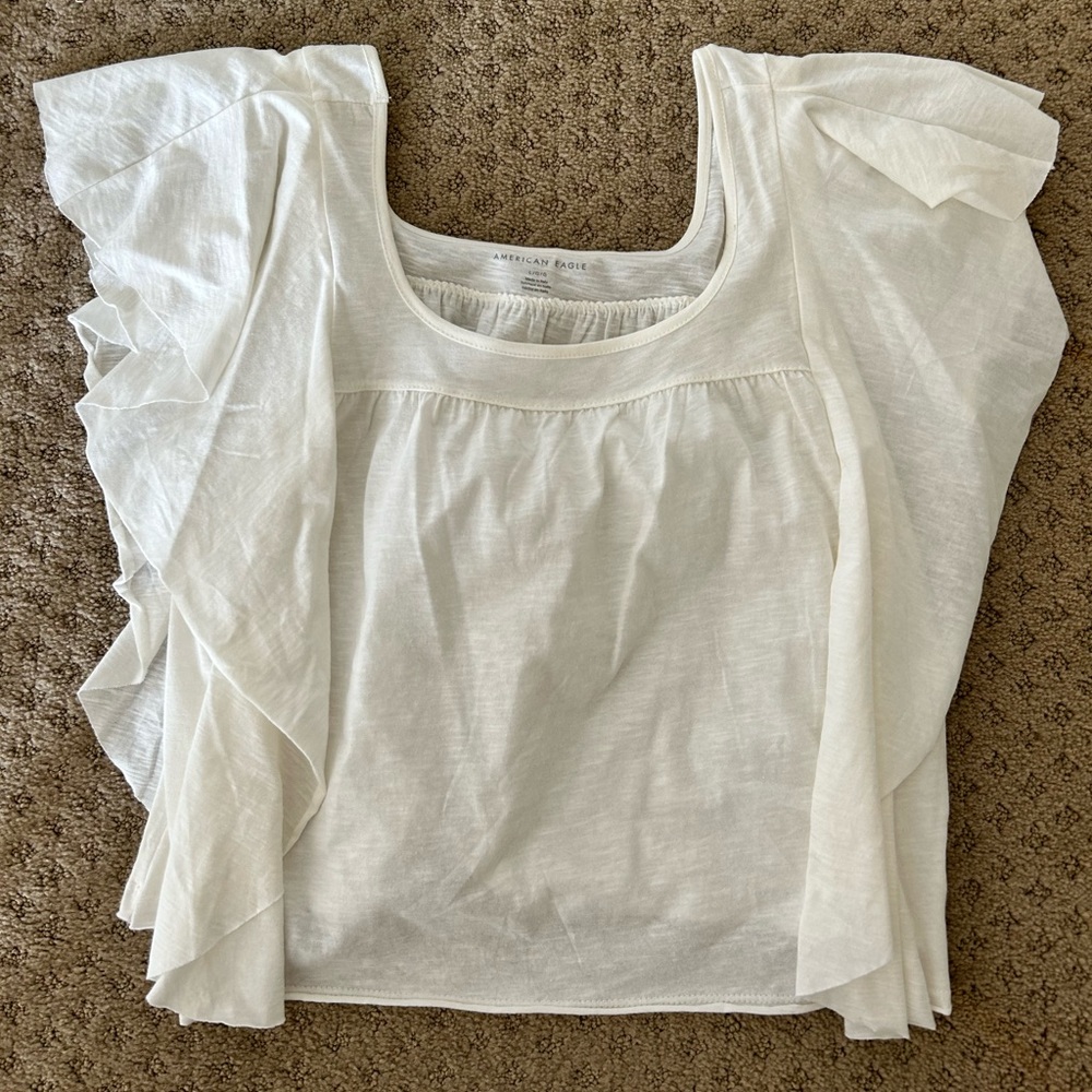 AE off white ruffle top